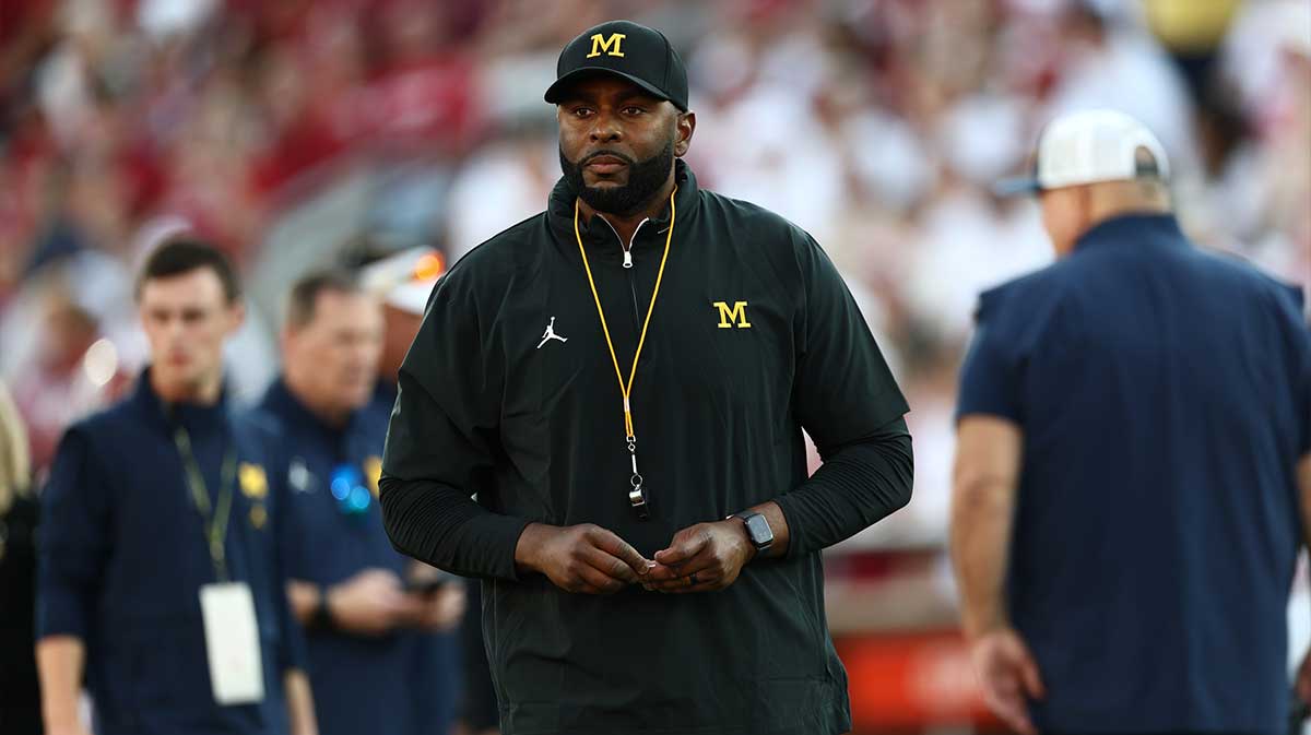 Michigan Wolverines head coach Sherrone Moore stands on the sideline prior to a game against the Oklahoma Sooners at Gaylord Family-Oklahoma Memorial Stadium.
