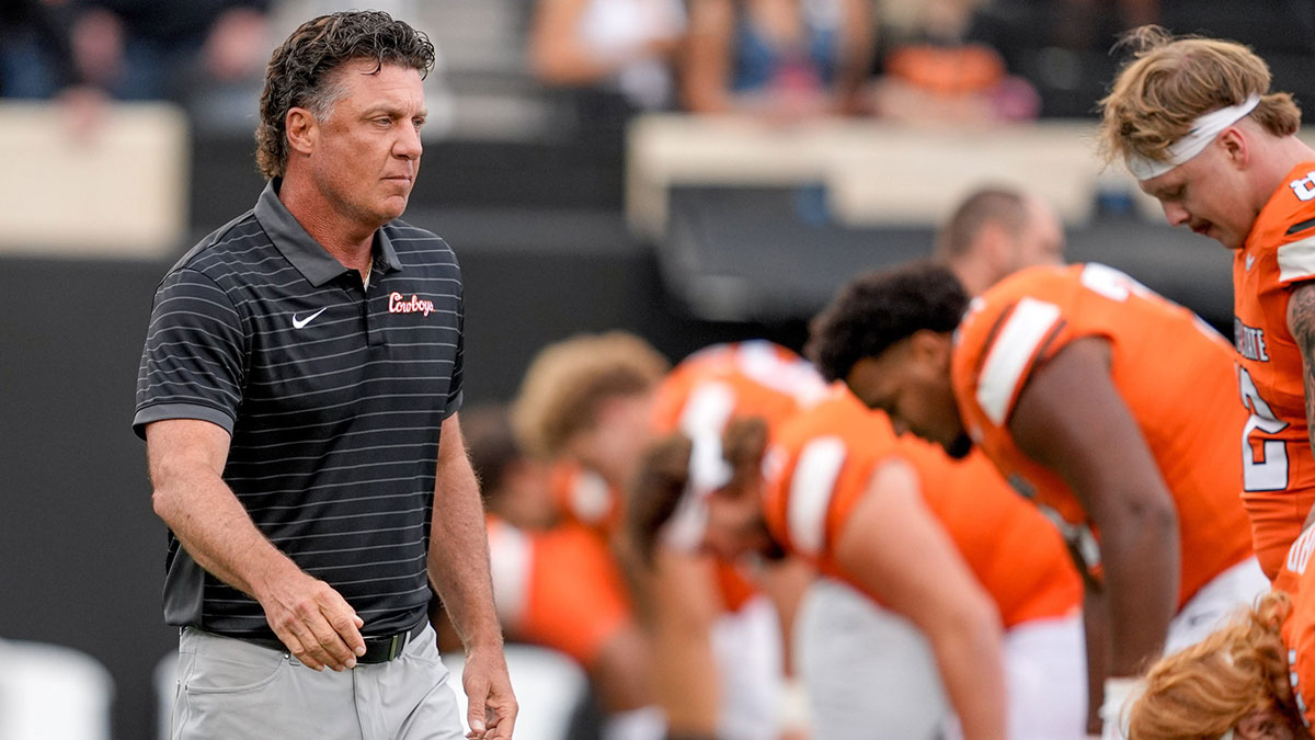 Oklahoma State Head coach Mike Gundy walks on the field before an NCAA football game between Oklahoma State (OSU) and UT Martin in Stillwater, Okla., on Thursday, Aug. 28, 2025.