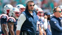 New England Patriots head coach Mike Vrabel watches from the sideline against the Miami Dolphins during the first quarter at Hard Rock Stadium.