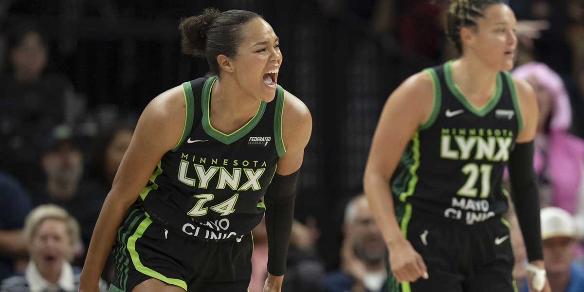 Minnesota Lynx forward Napheesa Collier (24) celebrates making a three point shot against the Golden State Valkyries in the first half at Target Center.