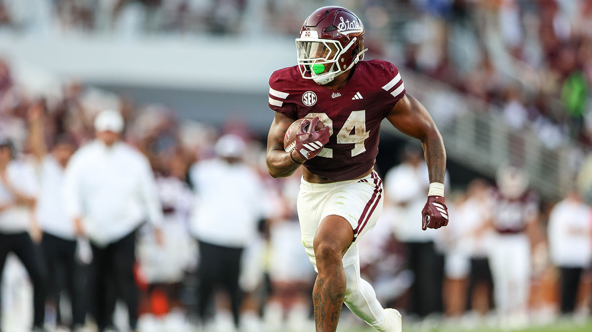 Mississippi State Bulldogs running back Fluff Bothwell (24) runs with the ball against the Alcorn State Braves during the second quarter at Davis Wade Stadium at Scott Field