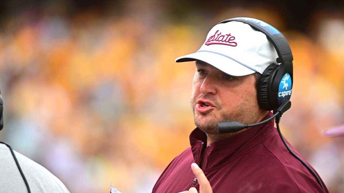 Mississippi State Bulldogs head coach Jeff Lebby talks into his headset against the Southern Miss Golden Eagles during the first quarter at M.M. Roberts Stadium in Hattiesburg, Miss., on Aug. 30, 2025.