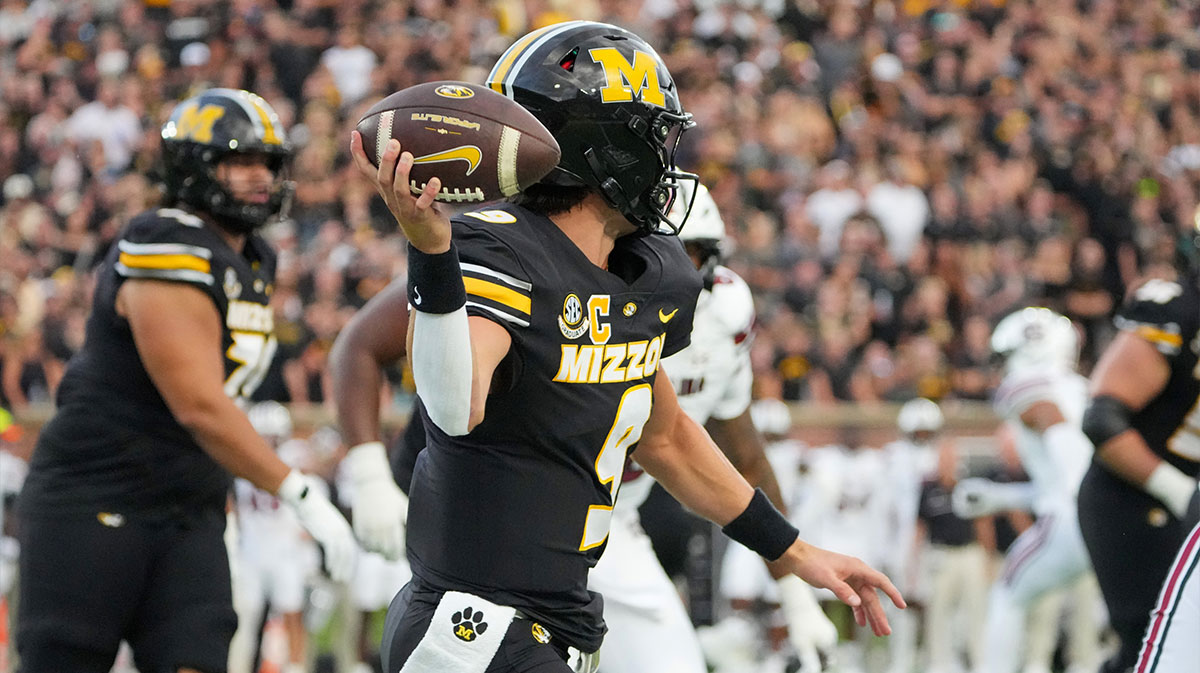  Missouri Tigers quarterback Beau Pribula (9) throws a pass against the South Carolina Gamecocks during the first half of the game at Faurot Field at Memorial Stadium. 