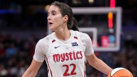 Washington Mystics guard Sonia Citron (22) looks to pass the ball during the first half of a game against the Indiana Fever on Friday, Aug. 15, 2025, at Gainbridge Fieldhouse in Indianapolis. The Fever fell to the Mystics 88-84.