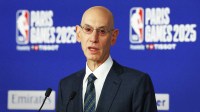 Paris, FRANCE; NBA commissioner Adam Silver speaks before the Paris Games 2025 NBA basketball game between the San Antonio Spurs and Indiana Pacers at Accor Arena.