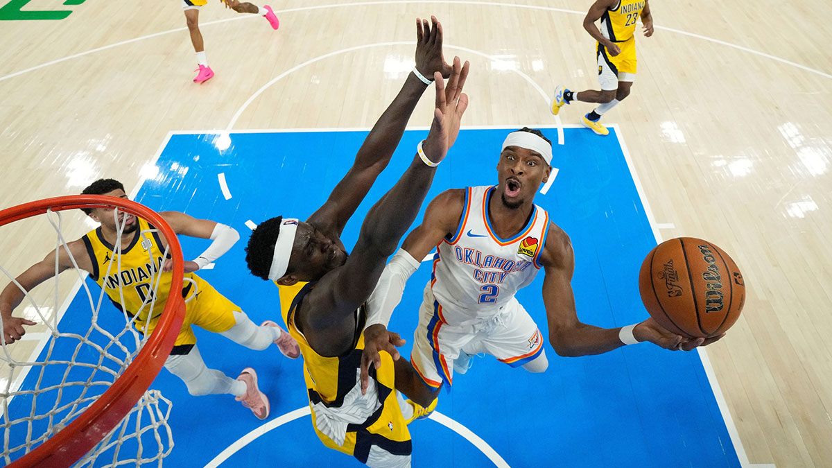 Oklahoma City Thunder guard Shai Gilgeous-Alexander (2) shoots the ball against Indiana Pacers forward Pascal Siakam (43) during the second quarter in game one of the 2025 NBA Finals at Paycom Center.