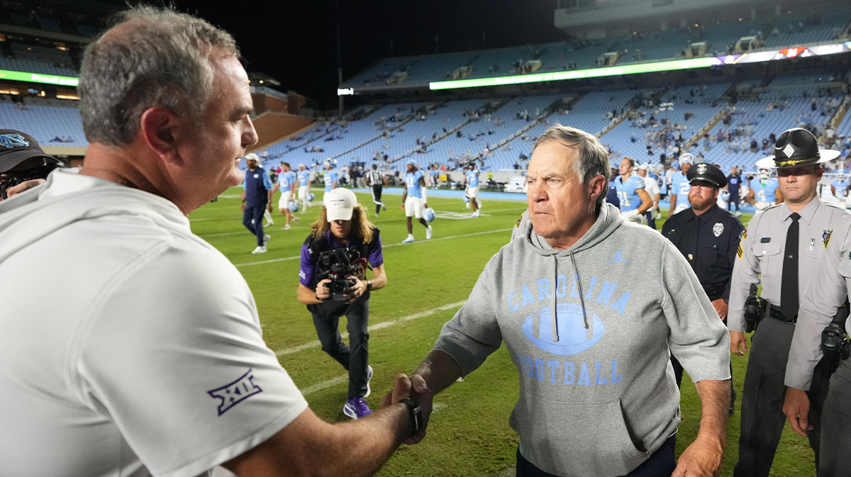 North Carolina Tar Heels head coach Bill Belichick with TCU Horned Frogs head coach Sonny Dykes after the game at Kenan Stadium.