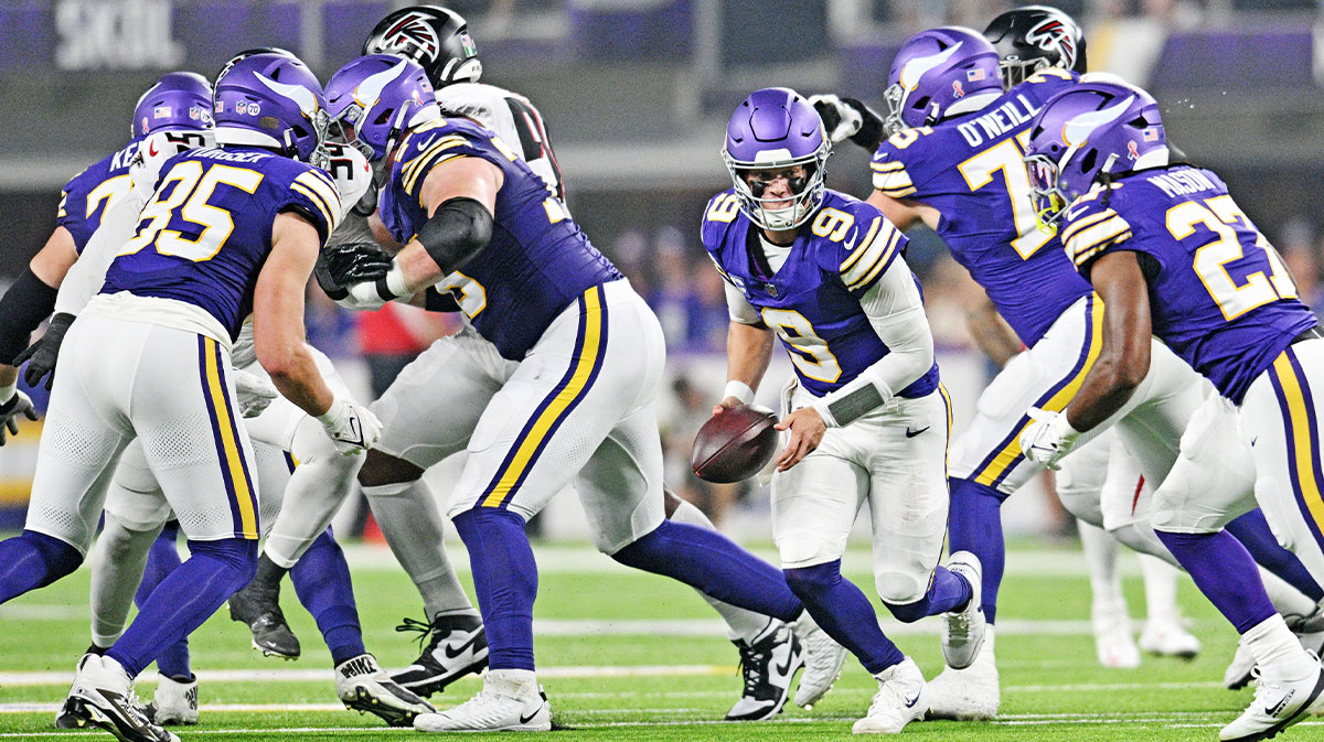 Minnesota Vikings quarterback J.J. McCarthy (9) runs the ball during the first half against the Atlanta Falcons at U.S. Bank Stadium.