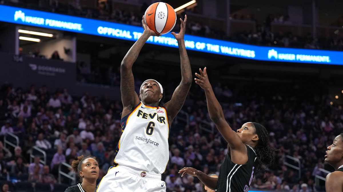 Indiana Fever forward Natasha Howard (6) shoots against Golden State Valkyries guard Kaila Charles (center right) during the third quarter at Chase Center.