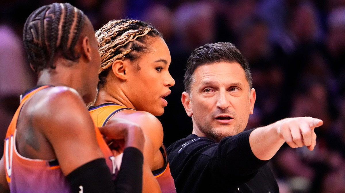 Phoenix Mercury head coach Nate Tibbetts talks with Phoenix forward Satou Sabally (0) during a timeout against the New York Liberty in the first half of Game One of the 2025 WNBA Playoffs first round at PHX Arena on Sept. 14, 2025. 