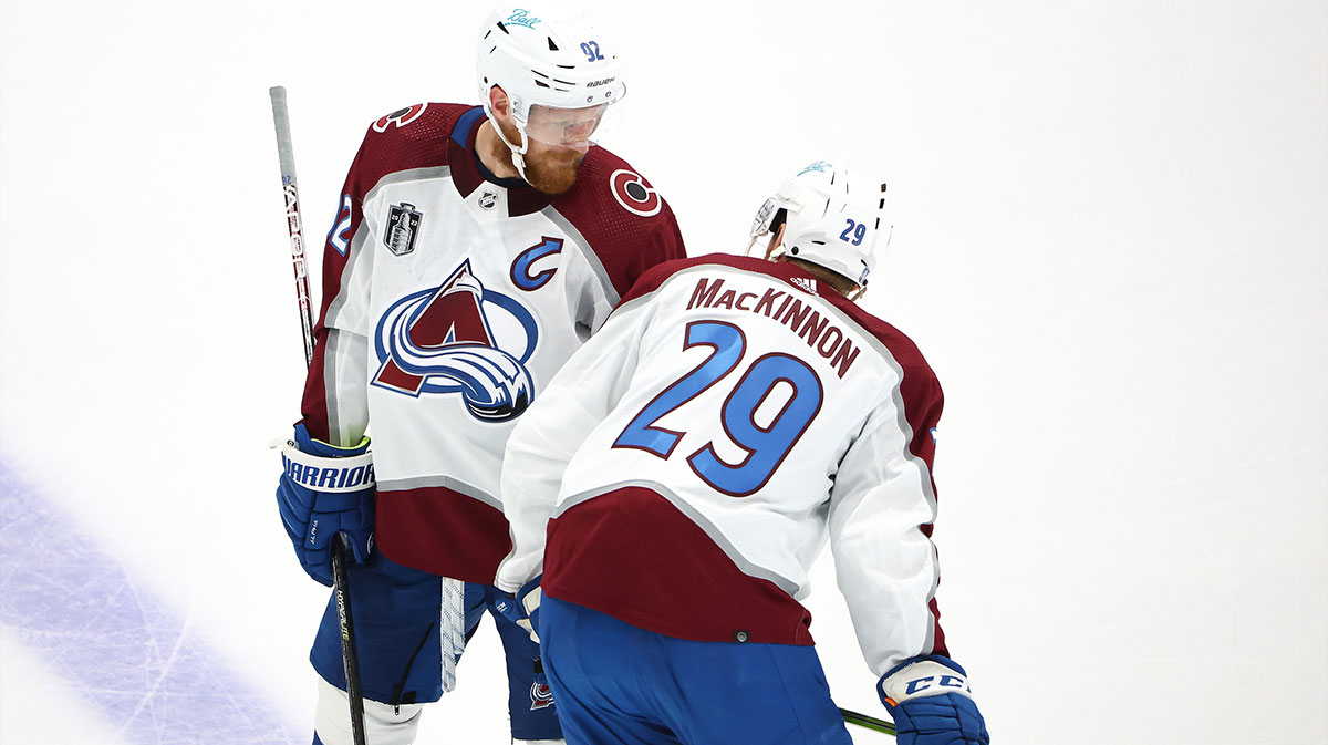 Colorado Avalanche left wing Gabriel Landeskog (92) talks with center Nathan MacKinnon (29) during the first period against the Tampa Bay Lightning in game four of the 2022 Stanley Cup Final at Amalie Arena.