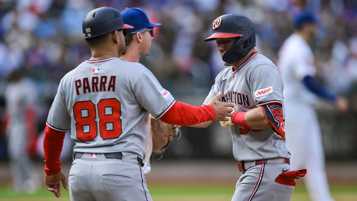 Washington Nationals outfielder Jacob Young (30) reacts after hitting a single against the New York Mets during the fifth inning at Citi Field.
