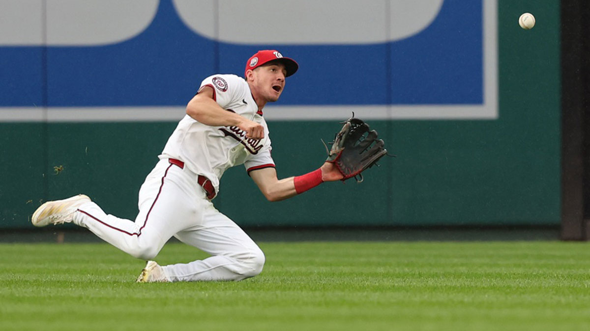 Washington Nationals outfielder Jacob Young (30) makes a catch on a line drive hit by Atlanta Braves outfielder Eli White (not pictured) during the eighth inning at Nationals Park.