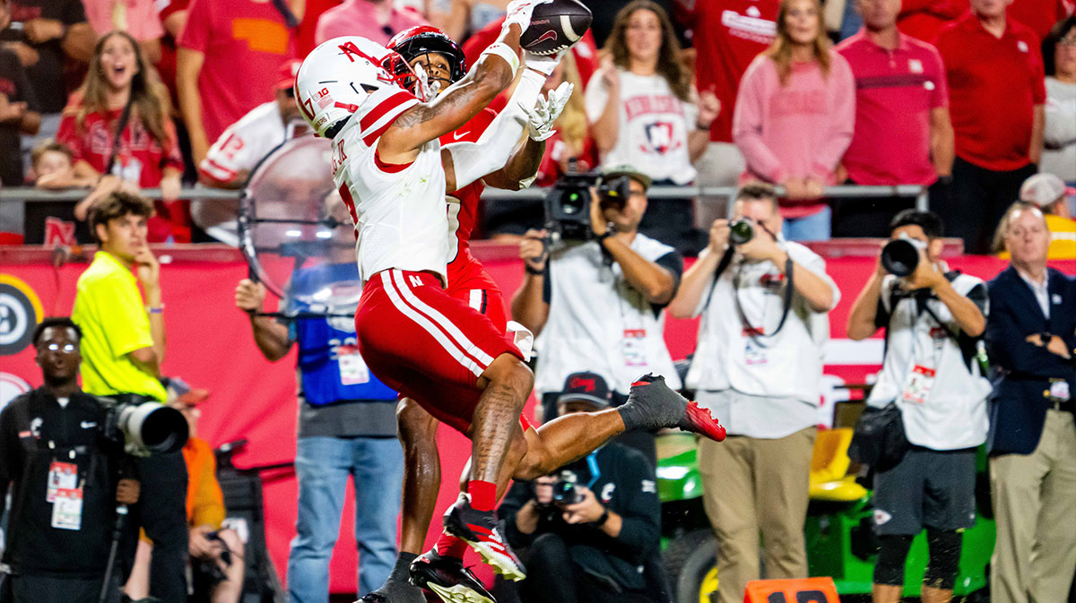 Nebraska Cornhuskers defensive back Malcolm Hartzog Jr. (7) intercepts a pass against Cincinnati Bearcats wide receiver Caleb Goodie (10) during the fourth quarter at GEHA Field at Arrowhead Stadium