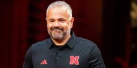 Nebraska Cornhuskers head coach Matt Rhule walks onto the field during warmups before the game against the Cincinnati Bearcats at GEHA Field at Arrowhead Stadium.
