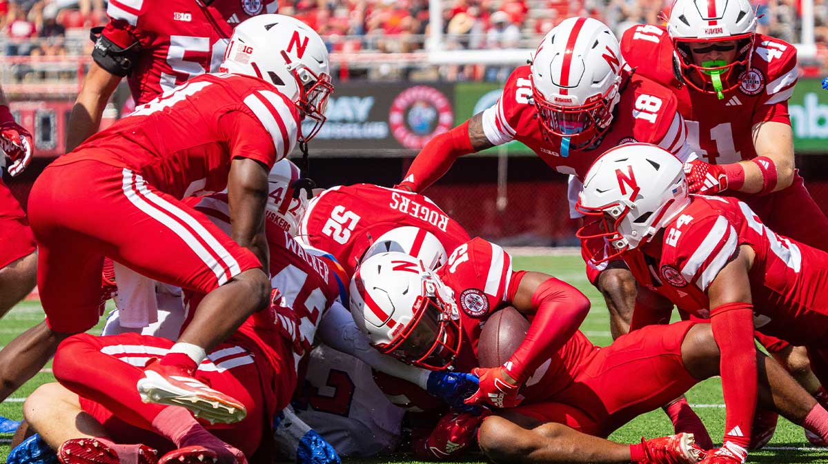 Nebraska Cornhuskers defensive back Justyn Rhett (19) recovers a fumble against the Houston Christian Huskies during the fourth quarter at Memorial Stadium.