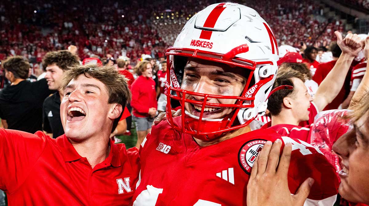 Nebraska Cornhuskers tight end Luke Lindenmeyer (44) celebrates with fans after defeating the Colorado Buffaloes at Memorial Stadium.