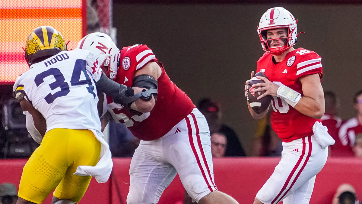 Nebraska Cornhuskers quarterback Heinrich Haarberg (10) looks to pass against the Michigan Wolverines during the fourth quarter at Memorial Stadium.