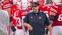 Nebraska Cornhuskers head coach Matt Rhule walks out of a huddle during their game against the Michigan Wolverines during the first quarter at Memorial Stadium.