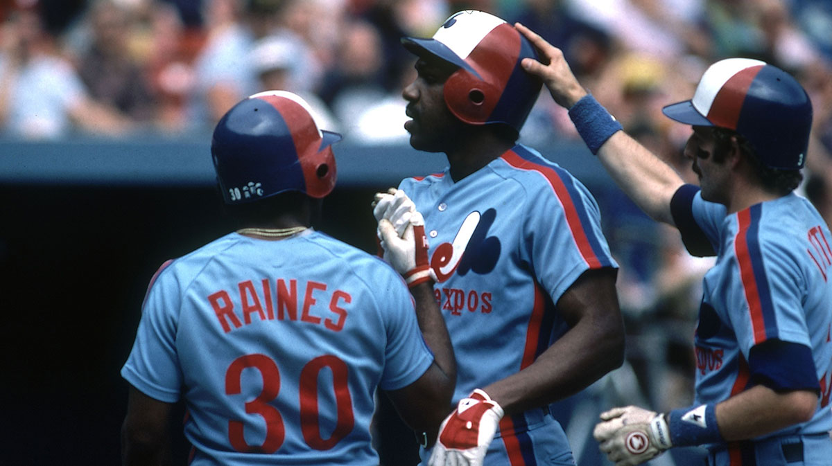 Unknown date and unknown location; USA, FILE PHOTO; Montreal Expos left fielder Andre Dawson is congratulated by teammates on the field during the 1982 season. Mandatory Credit: Malcolm Emmons-USA TODAY Network