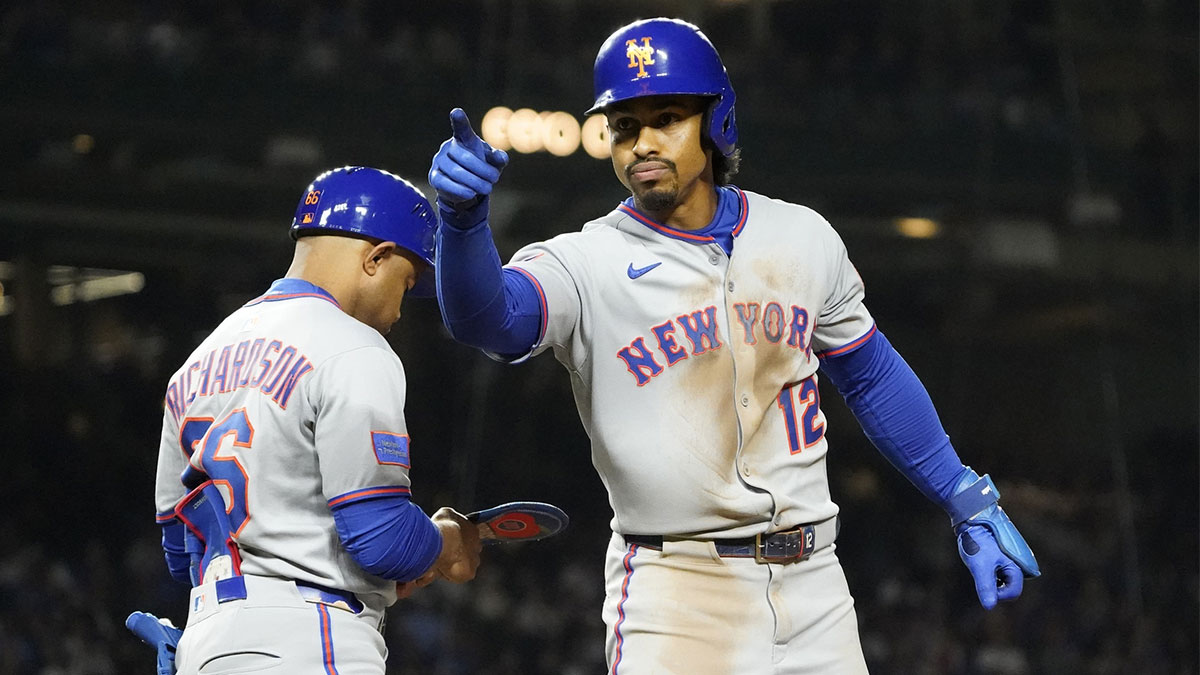 New York Mets shortstop Francisco Lindor (12) reacts after hitting a one run single against the Chicago Cubs during the sixth inning at Wrigley Field. Mandatory Credit: David Banks-Imagn Images