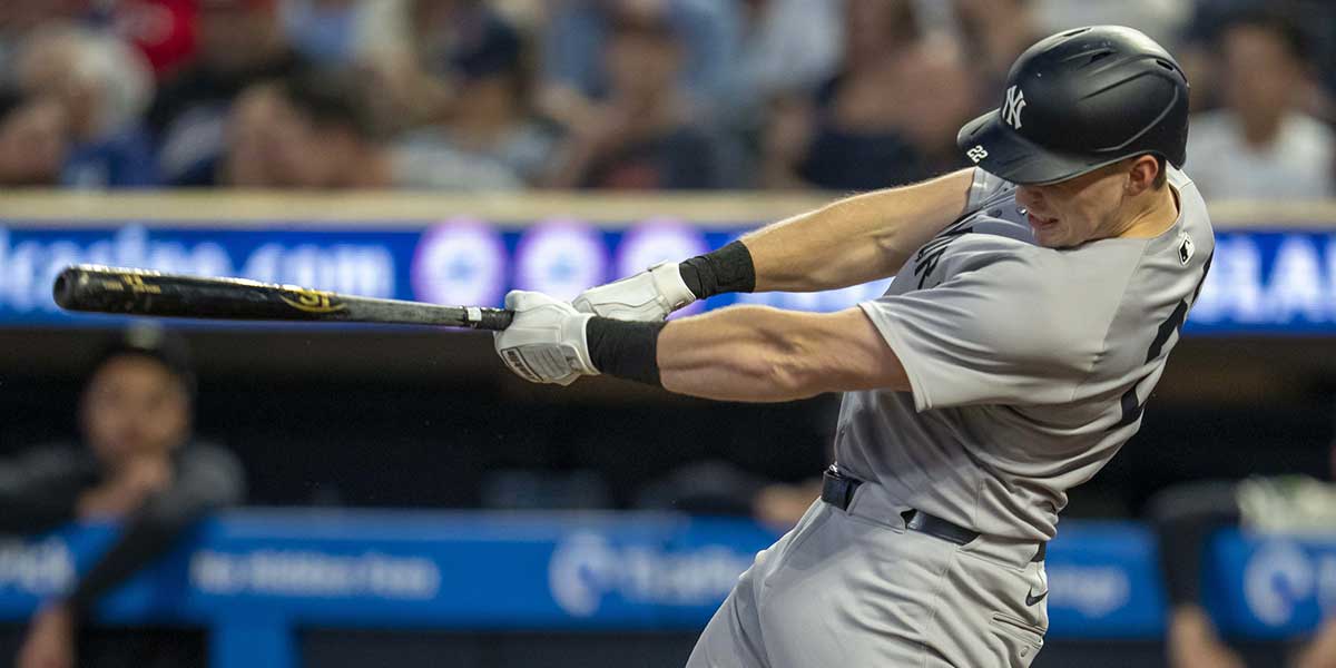 New York Yankees first baseman Ben Rice (22) hits a RBI double against the Minnesota Twins in the third inning at Target Field.