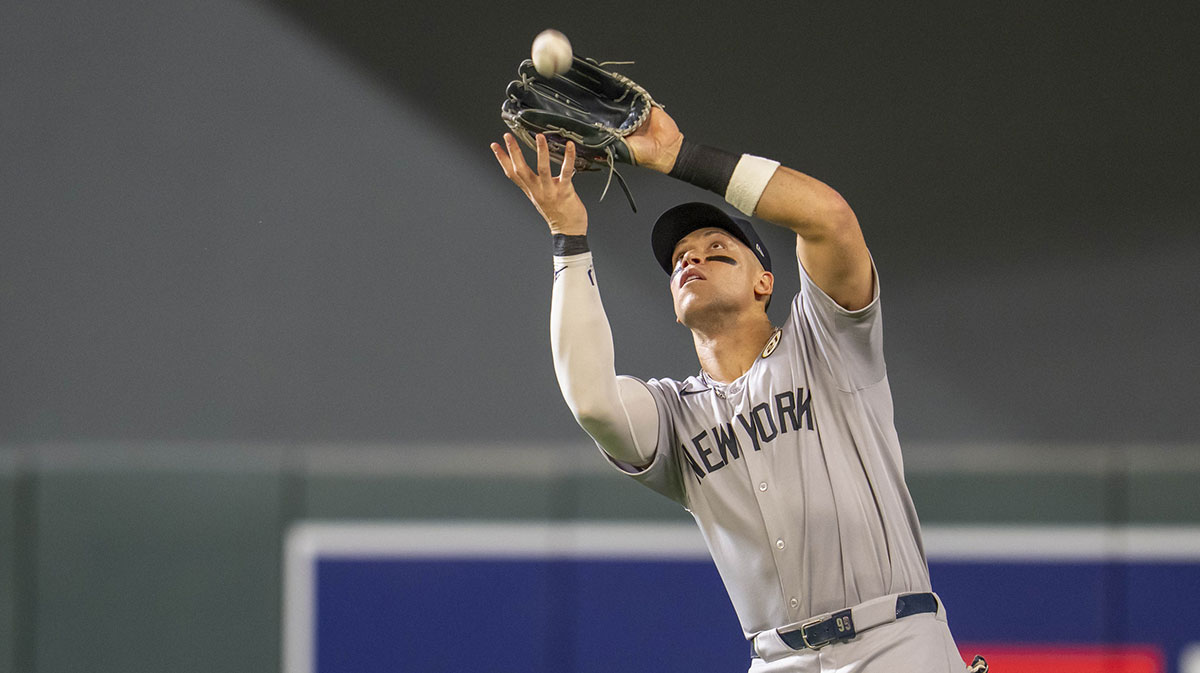 New York Yankees right fielder Aaron Judge (99) catches a fly ball against the Minnesota Twins in the fifth inning at Target Field.