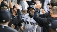 New York Yankees second base Jazz Chisholm Jr. (13) celebrates in the dugout after hitting a home run during the second inning against the Chicago White Sox at Rate Field. Mandatory Credit: Matt Marton-Imagn Images