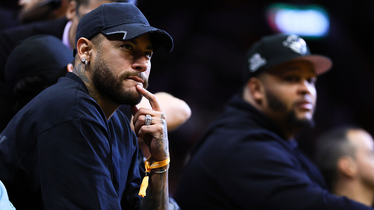Brazilian soccer player Neymar Jr. attends the game between the Golden State Warriors and the Miami Heat at Kaseya Center.