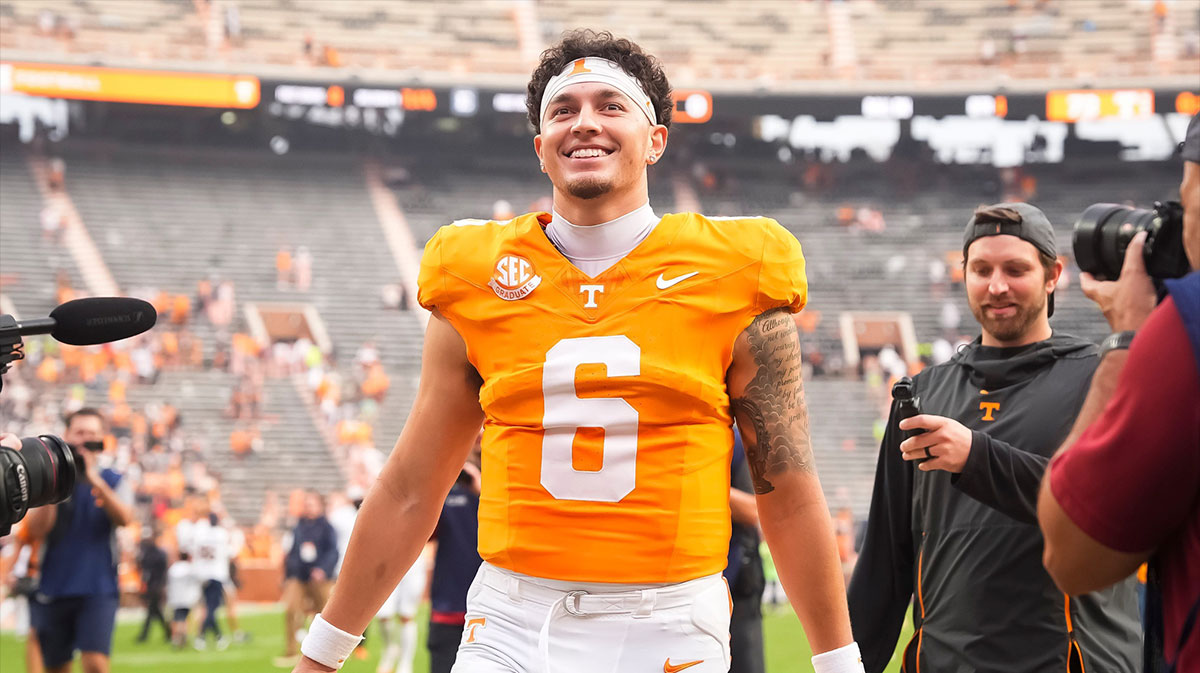 Tennessee quarterback Joey Aguilar (6) smiles as he walks off the field toward his family after Tennessee's home opener against ETSU at Neyland Stadium in Knoxville, Tenn., on Sept. 6, 2025.