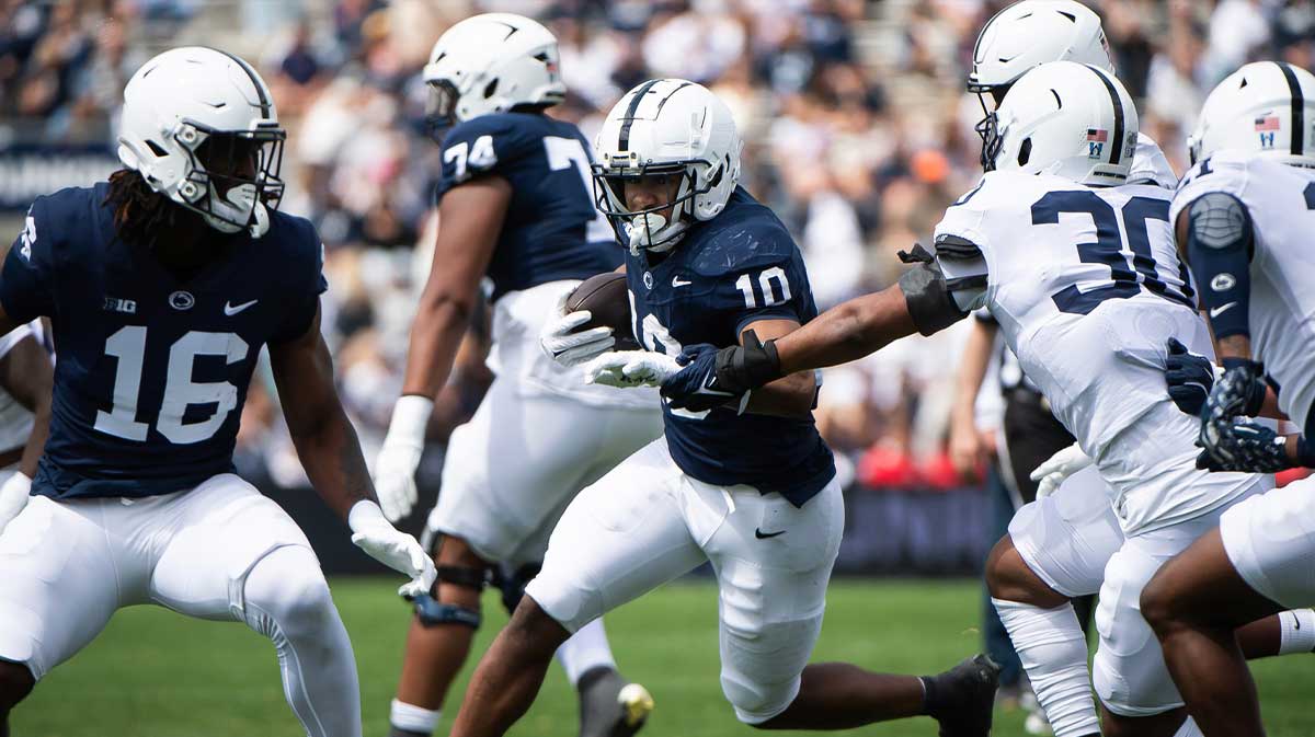 Penn State running back Nick Singleton (10) carries the ball during the Blue-White game at Beaver Stadium on Saturday, April 26, 2025, in State College. The White team defeated the Blue team, 10-8.
