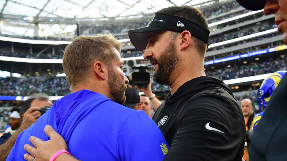 Los Angeles Rams head coach Sean McVay meets with Philadelphia Eagles head coach Nick Sirianni following the game at SoFi Stadium.