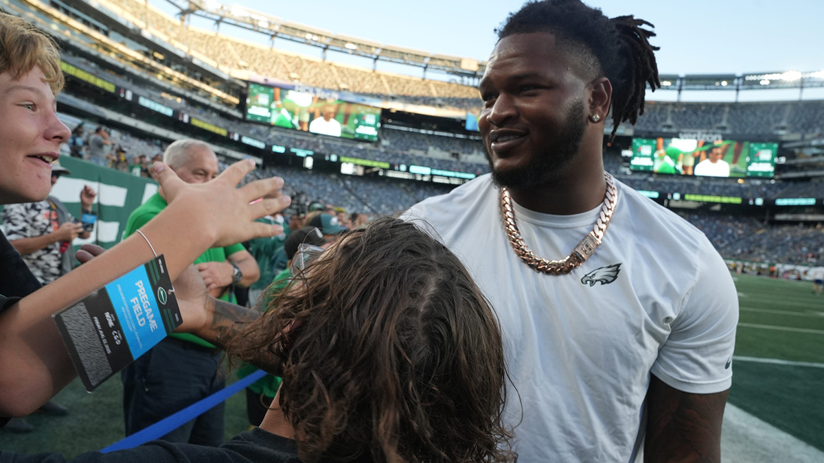 Jalen Carter of the Eagles signs autographs and takes photos with fans. The Philadelphia Eagles came to MetLife Stadium.