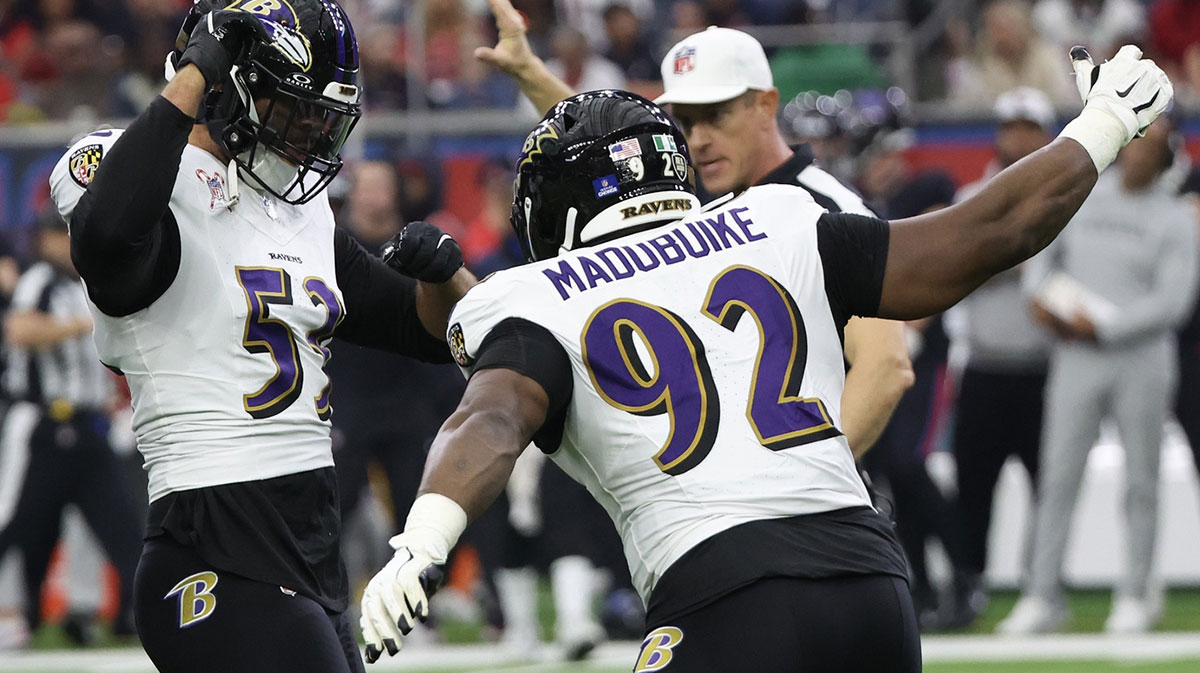 Baltimore Ravens defensive tackle Nnamdi Madubuike (92) celebrates linebacker Kyle Van Noy (53) sack against Houston Texans quarterback C.J. Stroud (7) (not pictured) in the first quarter at NRG Stadium
