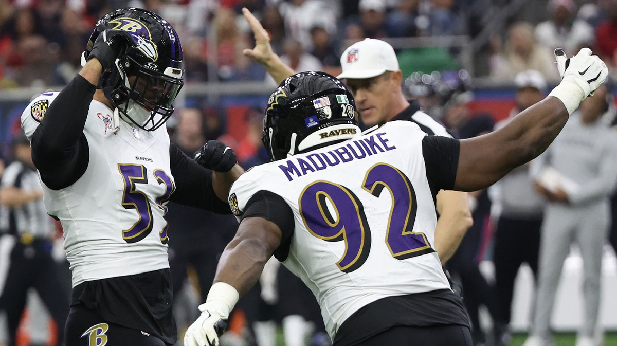 Baltimore Ravens defensive tackle Nnamdi Madubuike (92) celebrates linebacker Kyle Van Noy (53) sack against Houston Texans quarterback C.J. Stroud (7) (not pictured) in the first quarter at NRG Stadium.