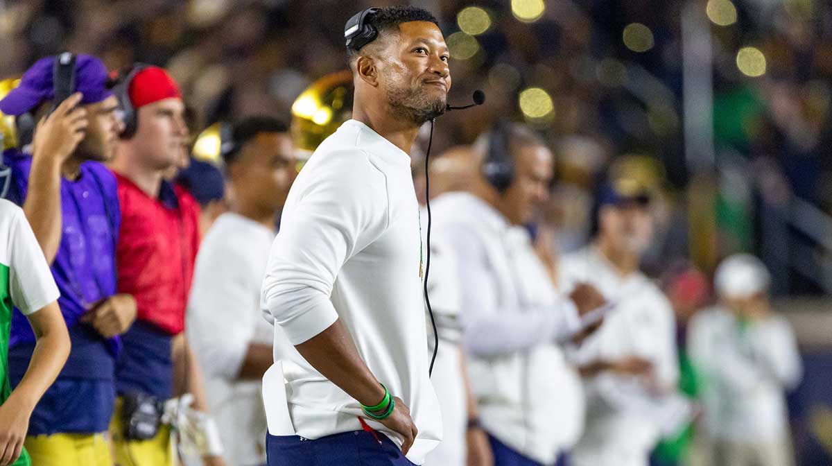 Notre Dame Fighting Irish head coach Marcus Freeman looks at the scoreboard during the second half against the Texas A&M Aggies at Notre Dame Stadium.