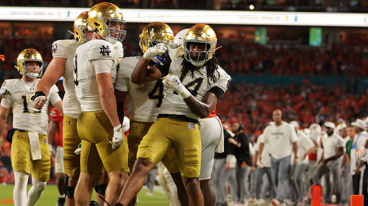 Notre Dame Fighting Irish wide receiver Micah Gilbert (14) reacts after scoring a touchdown against the Miami Hurricanes during the second quarter at Hard Rock Stadium.
