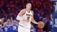 Nuggets center Nikola Jokic (15) dribbles down the court against the Oklahoma City Thunder in the second quarter during game seven of the second round for the 2025 NBA Playoffs at Paycom Center