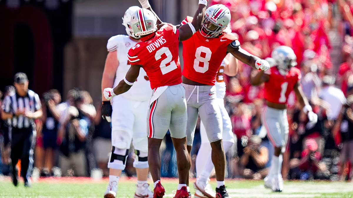 Ohio State Buckeyes safety Caleb Downs (2) and linebacker Arvell Reese (8) celebrate in the second half at Ohio Stadium on Saturday, Aug. 30, 2025 in Columbus, Ohio.