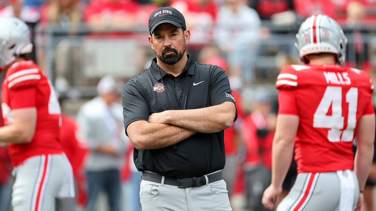 Ohio State Buckeyes head coach Ryan Day watches warmups before a game against the Grambling State Tigers at Ohio Stadium.