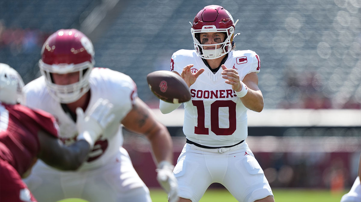 Oklahoma Sooners quarterback John Mateer (10) snaps the ball against the Temple Owls in the first half at Lincoln Financial Field.