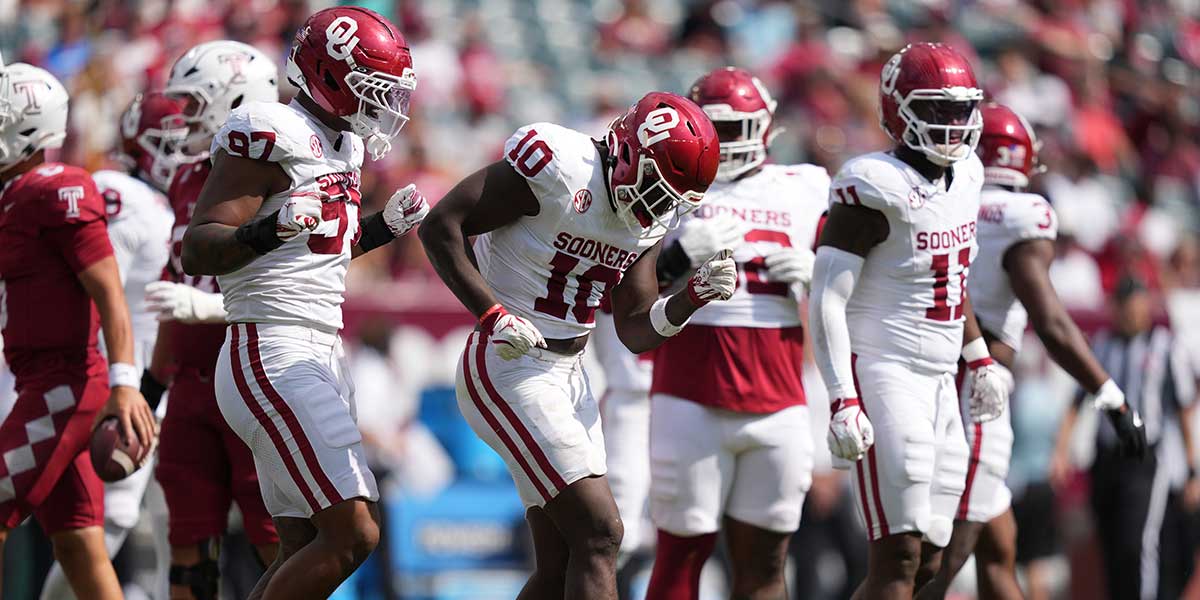Oklahoma Sooners linebacker Kip Lewis (10) reacts against the Temple Owls in the second half at Lincoln Financial Field.