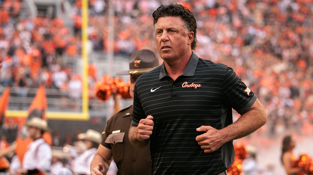 Oklahoma State Cowboys coach Mike Gundy takes the field prior to the game against the Tennessee Martin Skyhawks at Boone Pickens Stadium.