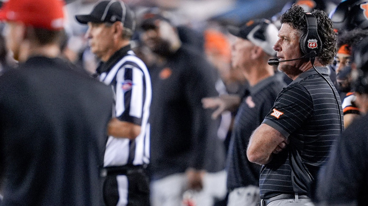 Oklahoma State head coach Mike Gundy stands on the sidelines in the third quarter during an NCAA football game between Oklahoma State (OSU) and Tulsa.