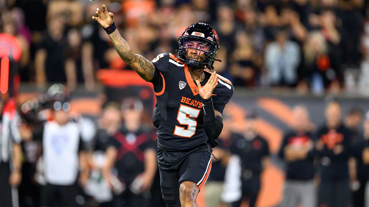 Oregon State Beavers quarterback Gabarri Johnson (5) throws a pass during the second quarter against the California Golden Bears at Reser Stadium. 