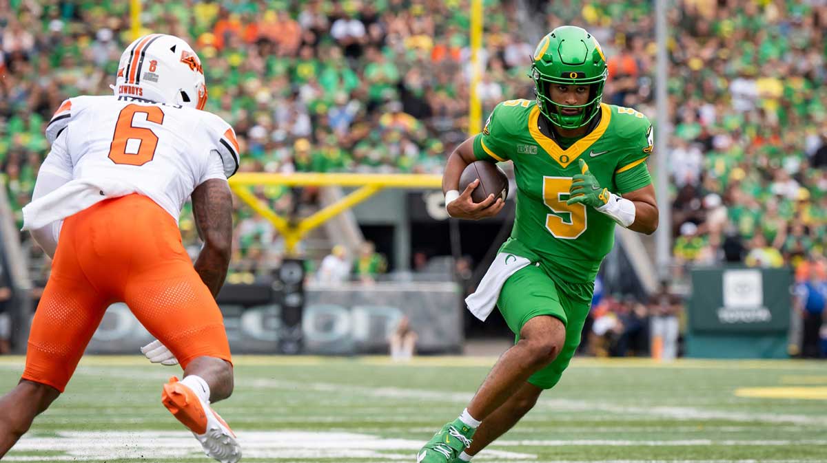 Oregon quarterback Dante Moore carries the ball as the Oregon Ducks host the Oklahoma State Cowboys on Sept. 6, 2025, at Autzen Stadium in Eugene, Oregon.