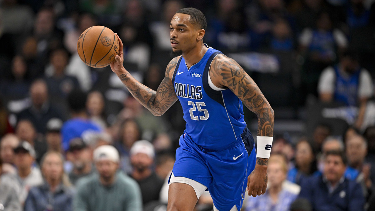 Dallas Mavericks forward P.J. Washington (25) brings the ball up court against the Brooklyn Nets during the first quarter at the American Airlines Center.