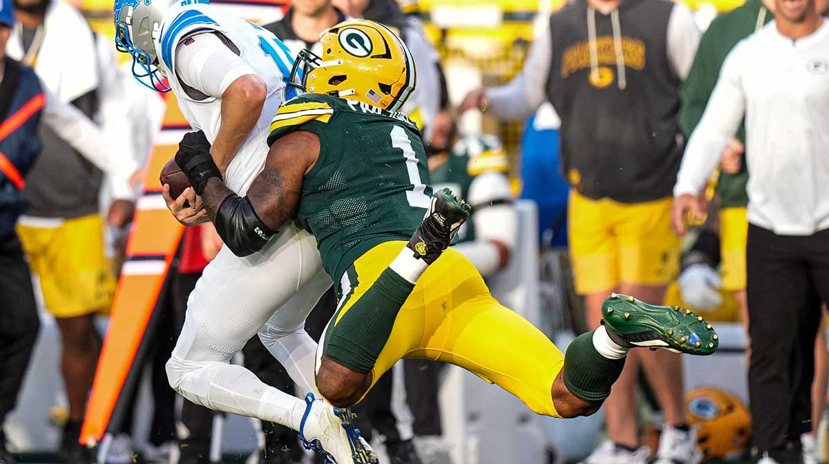 Detroit Lions quarterback Jared Goff (16) is sacked by Green Bay Packers defensive end Micah Parsons (1) during the second half at Lambeau Field in Green Bay, Wis., on Sunday, September 7, 2025.