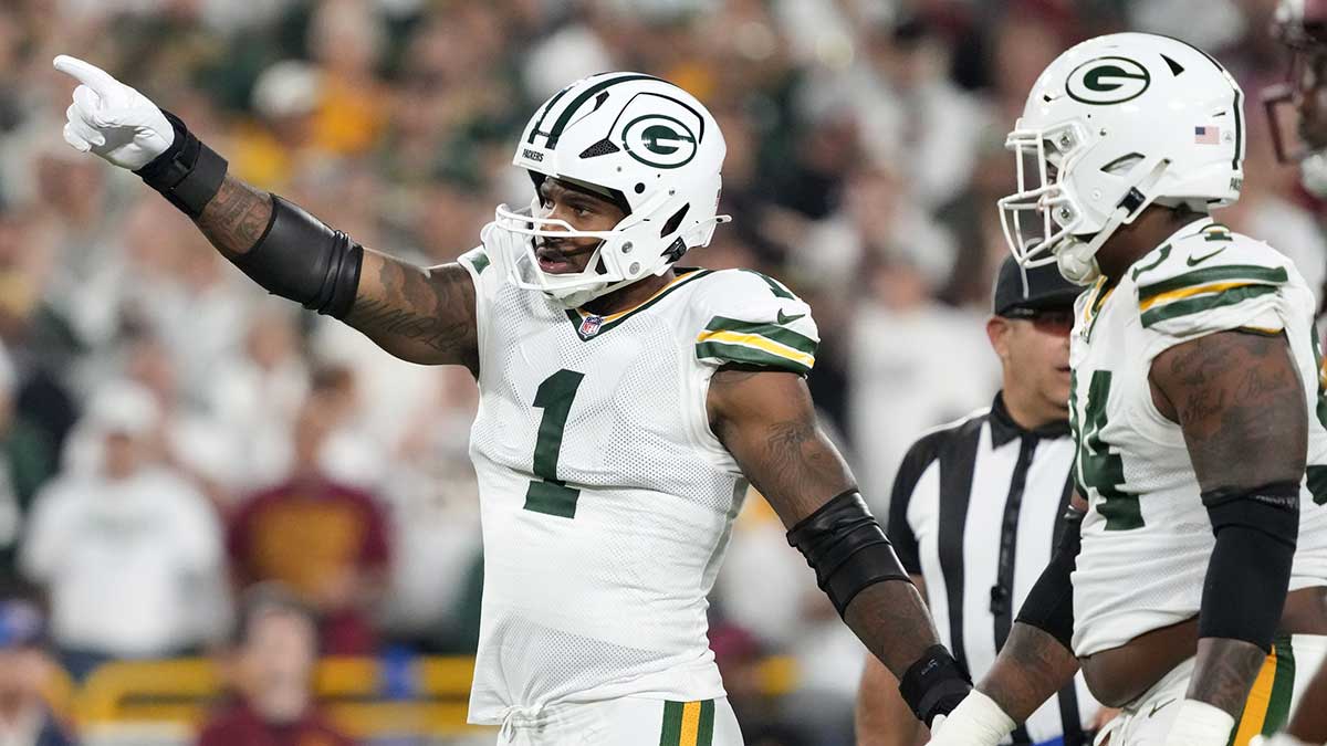 Green Bay Packers defensive end Micah Parsons (1) reacts in the first quarter against the Washington Commanders at Lambeau Field.