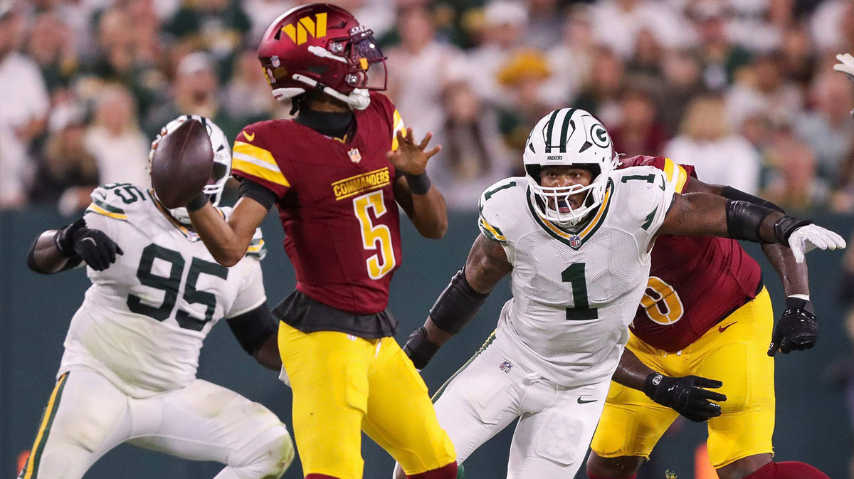Packers defensive end Micah Parsons (1) rushes Washington Commanders quarterback Jayden Daniels (5) at Lambeau Field